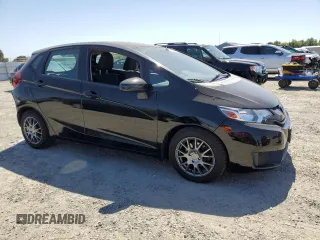 2015 Honda Fit LX with VIN 3HGGK5H52FM706660, listed as a Copart auction lot 60261745 with 118,954 mi miles and Salvage title. Bid and sale history available at DreamBid. Image 4.