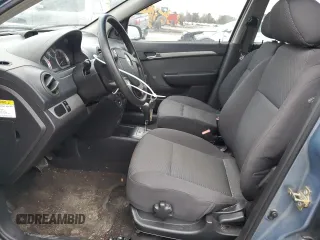 2007 Chevrolet Aveo LS z VIN KL1TD56607B126715, wystawiony jako Copart lot #85206134 z przebiegiem 85 420 mil mil oraz Szkody całkowita. Historia ofert i sprzedaży dostępna na DreamBid. Obrazek 7.