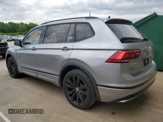 2021 Volkswagen Tiguan SE z VIN 3VV3B7AX8MM117650, wystawiony jako Copart lot #57075485 z przebiegiem 51 309 mil mil oraz Szkoda całkowita • Salvage title. Historia ofert i sprzedaży dostępna na DreamBid. Obrazek 2.