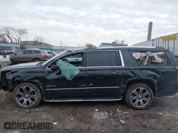2016 GMC Yukon XL Denali with VIN 1GKS2HKJ8GR406450, listed as a IAAI auction lot 41661050 with 125,830 mi miles. Bid and sale history available at carsss.com. Image 15.