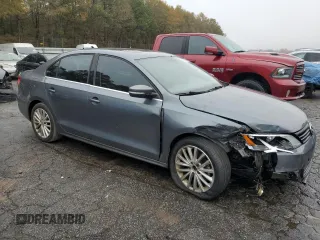 2012 Volkswagen Jetta Sedan SEL w/Sunroof with VIN 3VWLX7AJ7CM389484, listed as a Copart auction lot 83857594 with 212,348 mi miles and Salvage Title. Bid and sale history available at carsss.com. Image 4.