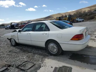 1997 Acura RL Premium Pkg with VIN JH4KA9655VC005115, listed as a Copart auction lot 48745265 with 0 mi miles and Salvage Title. Bid and sale history available at carsss.com. Image 2.