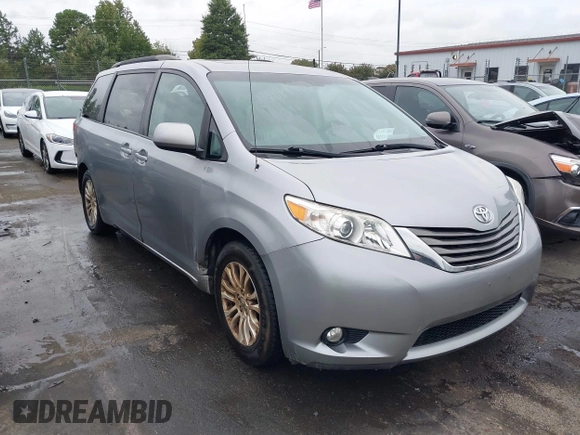 2012 Toyota Sienna XLE AAS with VIN 5TDYK3DC6CS243008, listed as a IAAI auction lot 40351580 with 157,752 mi miles and . Bid and sale history available at DreamBid. Image 1.