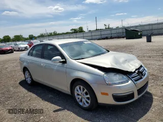 2010 Volkswagen Jetta Limited Edition z VIN 3VWAX7AJ2AM106655, wystawiony jako Copart lot #57489395 z przebiegiem 110 482 mil mil oraz Szkoda całkowita • Salvage title. Historia ofert i sprzedaży dostępna na DreamBid. Obrazek 4.