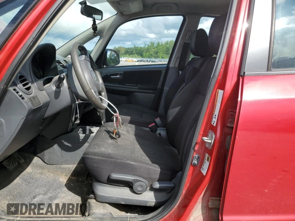 2012 Suzuki SX4 LE with VIN JS2YC5A34C6300079, listed as a Copart auction lot 68414434 with 111,661 mi miles and Salvage Title. Bid and sale history available at carsss.com. Image 7.