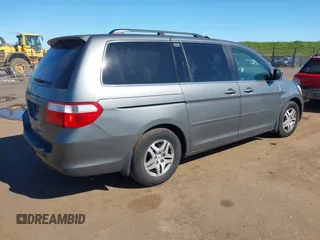 2007 Honda Odyssey EX-L z VIN 5FNRL386X7B405321, wystawiony jako IAAI lot #41703384 z przebiegiem 198 552 mil mil oraz . Historia ofert i sprzedaży dostępna na DreamBid. Obrazek 4.