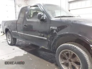 1997 Ford F-150 XL with VIN 1FTDX18W6VNB19712, listed as a IAAI auction lot 41740832 with 232,275 mi miles. Bid and sale history available at carsss.com. Image 6.