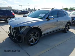2024 Genesis GV70 2.5T z VIN 5NMMADTB2RH006771, wystawiony jako IAAI lot #42011216 z przebiegiem 9482 mil mil oraz . Historia ofert i sprzedaży dostępna na DreamBid. Obrazek 2.