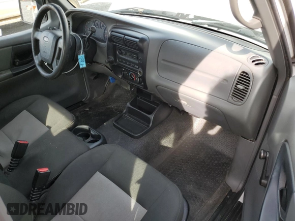 2010 Ford Ranger with VIN 1FTLR1EE1APA37032, listed as a Copart auction lot 82587614 with 215,440 mi miles and Salvage Title. Bid and sale history available at DreamBid. Image 8.