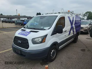 2015 Ford Transit Cargo z VIN 1FTNR1ZM8FKA55185, wystawiony jako IAAI lot #42515954 z przebiegiem 86 918 mil mil oraz . Historia ofert i sprzedaży dostępna na DreamBid. Obrazek 16.