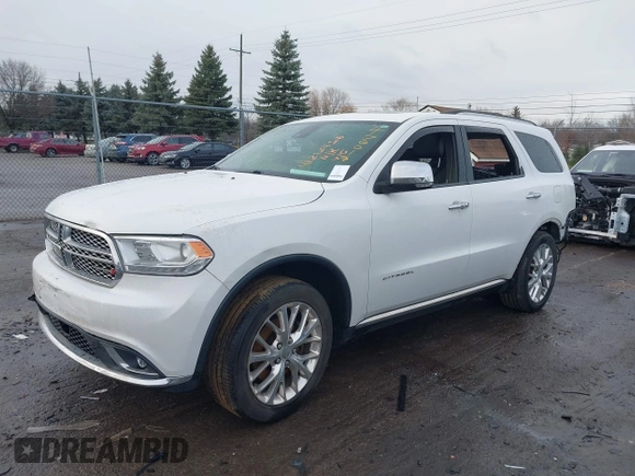 2014 Dodge Durango Citadel with VIN 1C4RDJEG0EC476018, listed as a IAAI auction lot 41212456 with 154,929 mi miles and . Bid and sale history available at DreamBid. Image 17.