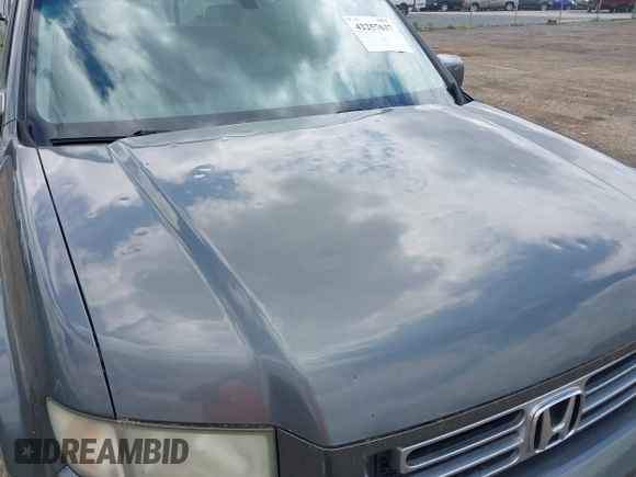 2007 Honda Ridgeline RTL z VIN 2HJYK16517H511157, wystawiony jako IAAI lot #42257637 z przebiegiem 266 894 mil mil oraz . Historia ofert i sprzedaży dostępna na DreamBid. Obrazek 6.