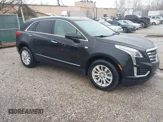 2018 Cadillac XT5 FWD with VIN 1GYKNARS6JZ160993, listed as a IAAI auction lot 41472847 with 113,415 mi miles. Bid and sale history available at carsss.com. Image 1.