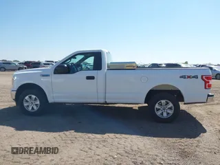 2019 Ford F-150 XL with VIN 1FTMF1EB1KKF02684, listed as a IAAI auction lot 42320140 with 185,189 mi miles and . Bid and sale history available at DreamBid. Image 14.