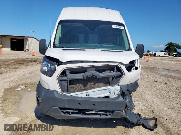 2023 Ford Transit Cargo z VIN 1FTBR3X84PKB10219, wystawiony jako Copart lot #60219385 z przebiegiem 83 059 mil mil oraz Szkoda całkowita • Salvage title. Historia ofert i sprzedaży dostępna na DreamBid. Obrazek 5.