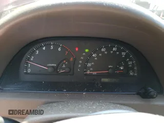 2004 Toyota Camry LE z VIN 4T1BE32K94U284667, wystawiony jako Copart lot #56184025 z przebiegiem 198 929 mil mil oraz Szkoda całkowita • Salvage title. Historia ofert i sprzedaży dostępna na DreamBid. Obrazek 9.