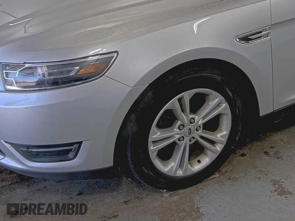 2016 Ford Taurus SEL with VIN 1FAHP2E88GG116319, listed as a IAAI auction lot 42189275 with 124,923 mi miles and . Bid and sale history available at DreamBid. Image 1.