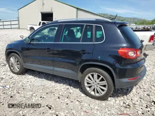2011 Volkswagen Tiguan SEL w/Premium Navi with VIN WVGAV7AX6BW511380, listed as a Copart auction lot 54360535 with 113,808 mi miles and Salvage title. Bid and sale history available at DreamBid. Image 2.