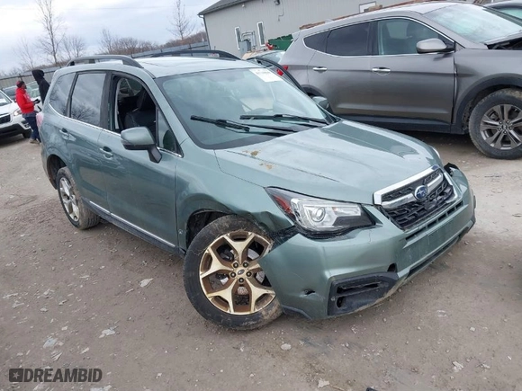 2017 Subaru Forester Touring with VIN JF2SJATC1HH517582, listed as a IAAI auction lot 41710840 with 81,920 mi miles. Bid and sale history available at carsss.com. Image 1.