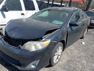 2012 Toyota Camry SE with VIN 4T1BK1FK2CU521649, listed as a IAAI auction lot 41852769 with 260,239 mi miles. Bid and sale history available at carsss.com. Image 2.