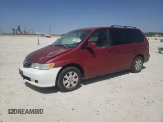 2003 Honda Odyssey EX-L z VIN 5FNRL18063B129004, wystawiony jako Copart lot #50189505 z przebiegiem 199 250 mil mil oraz Czysty tytuł • Clean title. Historia ofert i sprzedaży dostępna na DreamBid. Obrazek 1.