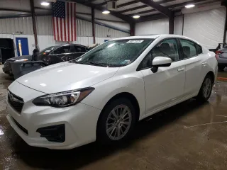 2017 Subaru Impreza Premium with VIN 4S3GKAD66H3604045, listed as a Copart auction lot 59871325 with 52,071 mi miles and Salvage title. Bid and sale history available at DreamBid. Image 1.