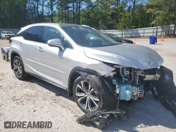 2019 Lexus RX 450h z VIN 2T2BGMCA3KC030470, wystawiony jako Copart lot #53247965 z przebiegiem Nie podano mil oraz Szkoda całkowita • Salvage title. Historia ofert i sprzedaży dostępna na DreamBid. Obrazek 4.
