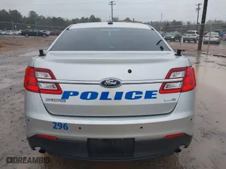 2015 Ford Sedan Police Interceptor with VIN 1FAHP2MK8FG190240, listed as a IAAI auction lot 41570580 with 131,158 mi miles. Bid and sale history available at carsss.com. Image 16.