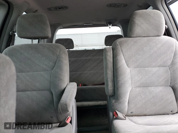 2003 Honda Odyssey EX z VIN 5FNRL18603B008148, wystawiony jako Copart lot #60669825 z przebiegiem 128 115 mil mil oraz Czysty tytuł • Clean title. Historia ofert i sprzedaży dostępna na DreamBid. Obrazek 10.