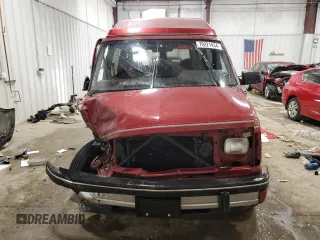 1992 GMC Safari z VIN 1GDEL19W2NB539396, wystawiony jako Copart lot #79221434 z przebiegiem 99 406 mil mil oraz Nie do naprawy. Historia ofert i sprzedaży dostępna na DreamBid. Obrazek 5.