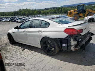 2015 BMW M6 z VIN WBS6C9C52FD467752, wystawiony jako Copart lot #67884554 z przebiegiem 60 729 mil mil oraz Szkody całkowita. Historia ofert i sprzedaży dostępna na DreamBid. Obrazek 2.