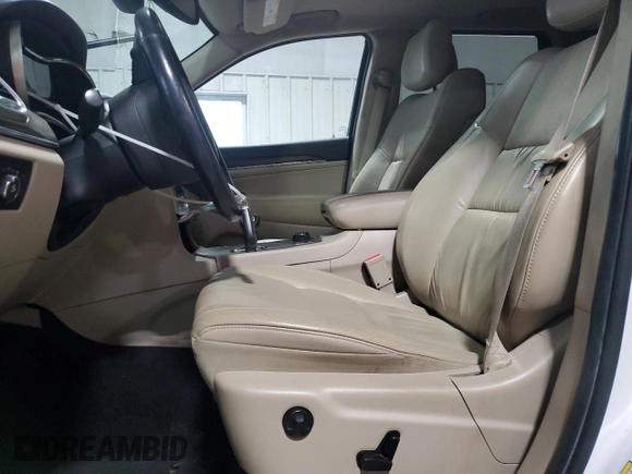 2014 Jeep Grand Cherokee Limited with VIN 1C4RJFBG1EC140601, listed as a Copart auction lot 56298305 with 131,193 mi miles and Salvage title. Bid and sale history available at DreamBid. Image 7.