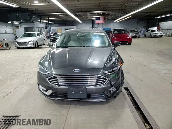 2017 Ford Fusion Titanium z VIN 3FA6P0SU3HR209563, wystawiony jako Copart lot #52039915 z przebiegiem 119 961 mil mil oraz Szkoda całkowita • Salvage title. Historia ofert i sprzedaży dostępna na DreamBid. Obrazek 11.
