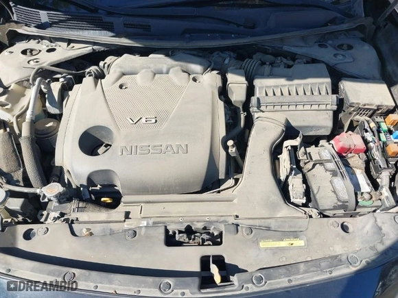 2017 Nissan Maxima SR with VIN 1N4AA6AP4HC406136, listed as a IAAI auction lot 41355573 with 112,111 mi miles. Bid and sale history available at carsss.com. Image 10.