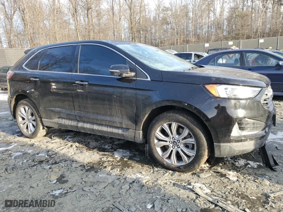 2022 Ford Edge Titanium with VIN 2FMPK4K92NBA52677, listed as a Copart auction lot 88791125 with 76,718 mi miles and Salvage Title. Bid and sale history available at carsss.com. Image 4.