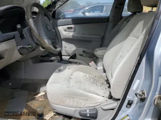 2006 Kia Spectra EX with VIN KNAFE121665348840, listed as a Copart auction lot 69798184 with 0 mi miles and Salvage Title. Bid and sale history available at carsss.com. Image 7.