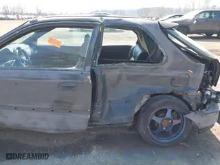 1996 Honda Civic DX with VIN 2HGEJ6344TH115500, listed as a IAAI auction lot 41783022 with 148,439 mi miles. Bid and sale history available at carsss.com. Image 17.