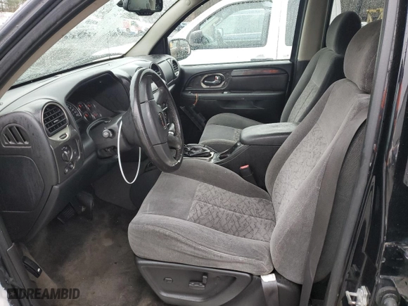 2006 GMC Envoy SLT with VIN 1GKDT13S862349565, listed as a Copart auction lot 83965094 with 0 mi miles and Salvage Title. Bid and sale history available at carsss.com. Image 7.