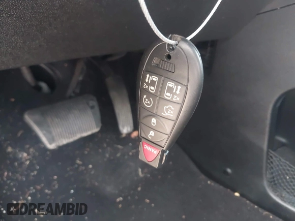 2019 Dodge Grand Caravan GT with VIN 2C4RDGEG3KR579133, listed as a IAAI auction lot 41934964 with 82,667 mi miles and . Bid and sale history available at DreamBid. Image 11.