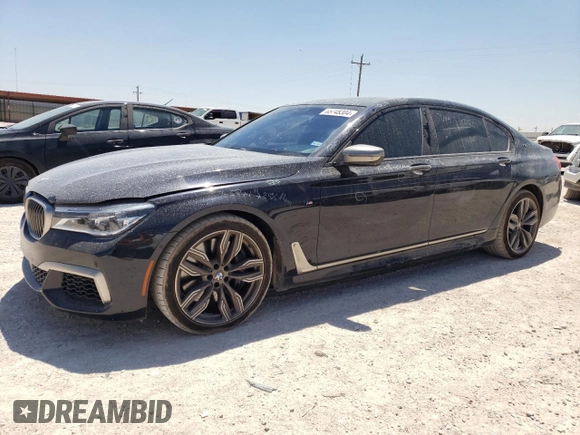 2018 BMW 7 Series M760i xDrive with VIN WBA7H6C51JG614580, listed as a Copart auction lot 65748304 with 46,801 mi miles and Clean Title. Bid and sale history available at carsss.com. Image 1.