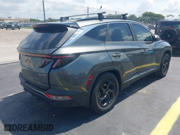 2022 Hyundai Tucson SEL with VIN 5NMJB3AE3NH069301, listed as a IAAI auction lot 42366081 with 26,971 mi miles and . Bid and sale history available at DreamBid. Image 4.