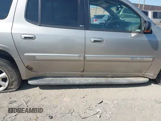 2003 GMC Envoy SLT with VIN 1GKES16S336101568, listed as a IAAI auction lot 40187998 with 185,402 mi miles. Bid and sale history available at carsss.com. Image 16.