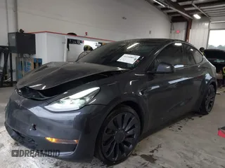 2024 Tesla Model Y Performance with VIN 7SAYGDEFXRF049338, listed as a IAAI auction lot 41240812 with 10,132 mi miles and . Bid and sale history available at DreamBid. Image 2.