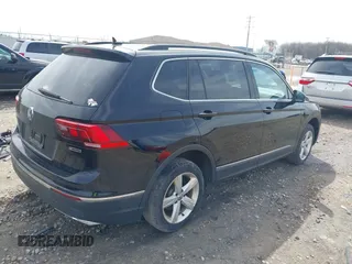 2021 Volkswagen Tiguan SE with VIN 3VV2B7AX4MM050282, listed as a IAAI auction lot 42124808 with 80,082 mi miles and . Bid and sale history available at DreamBid. Image 4.