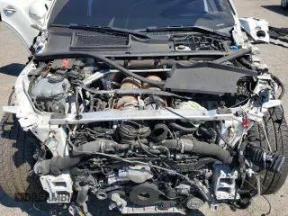 2021 Bentley Bentayga V8 z VIN SJAAM2ZVXMC032804, wystawiony jako Copart lot #70631504 z przebiegiem 37 960 mil mil oraz Szkoda całkowita • Salvage title. Historia ofert i sprzedaży dostępna na DreamBid. Obrazek 11.