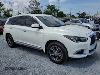 2020 Infiniti QX60 Pure with VIN 5N1DL0MM9LC520735, listed as a Copart auction lot 58567435 with 66,737 mi miles and Salvage title. Bid and sale history available at DreamBid. Image 4.