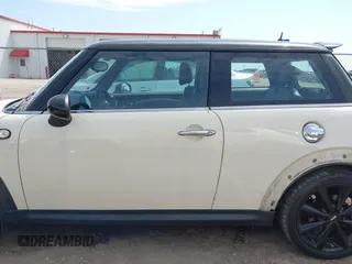 2012 MINI Hardtop S with VIN WMWSV3C5XCTY27099, listed as a IAAI auction lot 42248076 with 99,384 mi miles and . Bid and sale history available at DreamBid. Image 14.