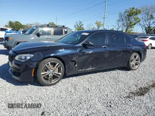 2015 BMW 7 Series 750Li with VIN WBAYE8C51FD781006, listed as a Copart auction lot 48202715 with 50,601 mi miles and Salvage Title. Bid and sale history available at carsss.com. Image 1.