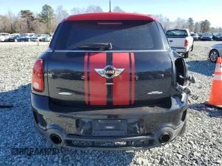 2014 MINI Countryman John Cooper Works with VIN WMWXD1C5XEWS34681, listed as a Copart auction lot 41781005 with 133,463 mi miles and Salvage Title. Bid and sale history available at DreamBid. Image 6.