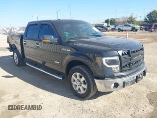 2013 Ford F-150 XL with VIN 1FTFW1CT5DKF20404, listed as a IAAI auction lot 41153325 with 148,608 mi miles. Bid and sale history available at carsss.com. Image 1.